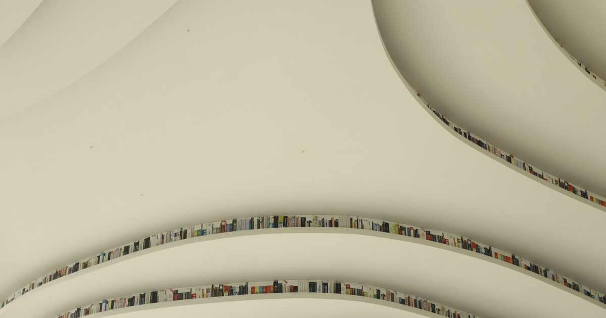 Soft cream-coloured curved layers that resemble sound waves